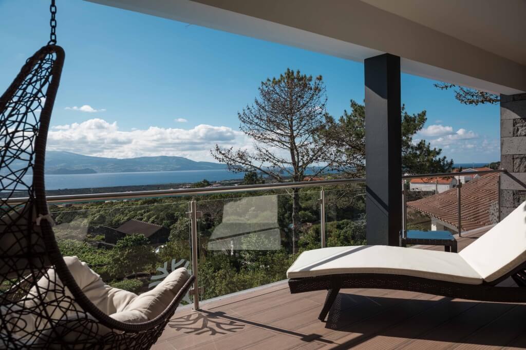 Panoramic ocean view from the private balcony at the luxury villa in Pico Island, Azores
